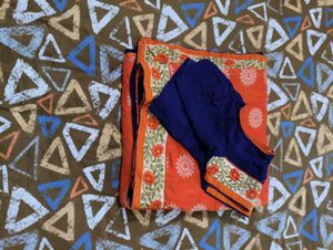 Orange Saree with Blue Blouse
