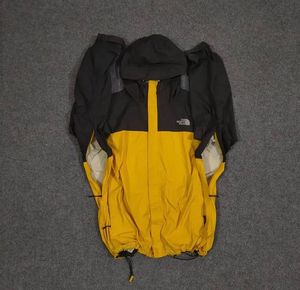 THE NORTH FACE YELLOW AND BLACK JACKET