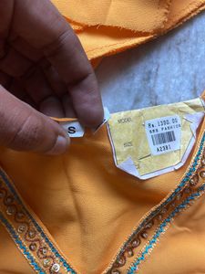 Orange Top With Tag