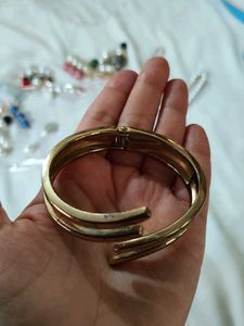 Unique Gold Tone C-Shaped Bracelet