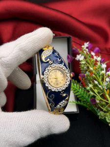 Elegant Peacock Bangle Watch