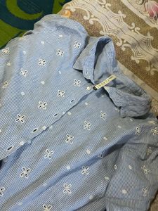 Femina flaunt shirt top