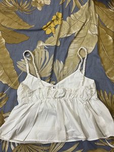 White peplum top