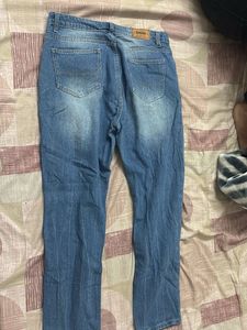Distressed Blue Denim Jeans