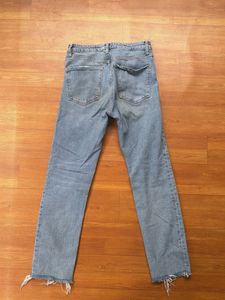 Light Wash Distressed Hem Jeans