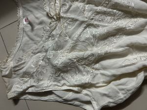 White Embroidered Sleeveless Kurta