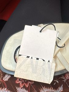 White Flat Sandals with Silver Detail