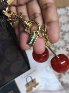 Cute Coach cherry 🍒 charm Keychain