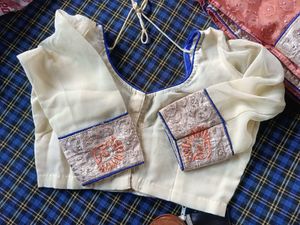 Orange Cream saree with blouse and peticoat