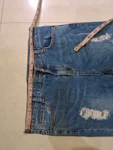 Distressed Blue Denim Jeans