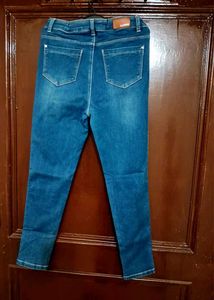 Stylish Blue Denim Jeans with Chain Detail