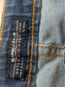 Distressed Blue Denim ladies Jeans low waist