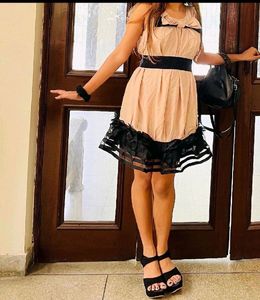 Frilled nude dress