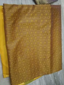 Elegant Mustard Saree with Intricate Pattern