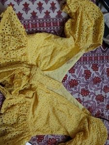 Yellow Eyelet Peplum Top