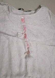 Elegant White Kurti with Subtle Pink Accents