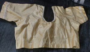 Golden tissue blouse with extra border work