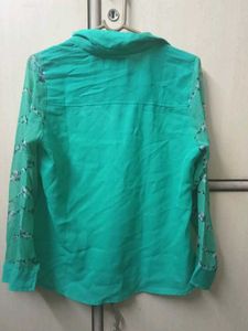 Elegant Teal Button-Up Shirt with Floral Sleeves