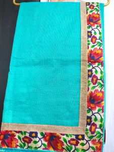 Beautiful Teal Saree with Floral Border