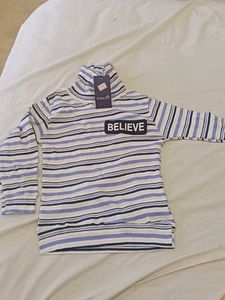 Striped Turtleneck with BELIEVE Patch
