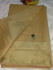 Elegant Beige Saree with Green Floral Embroidery