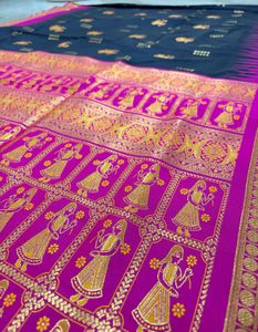 Elegant Black Saree with Pink Border