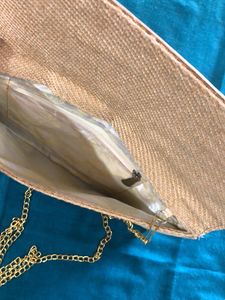 Embellished Peacock 🦚 clutch in jute finish..