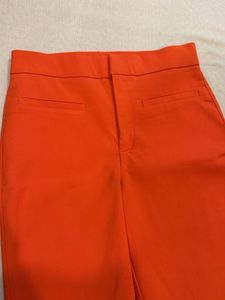 Vibrant Orange Cut-Out Top with pants