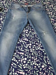 Blue Distressed Denim Jeans