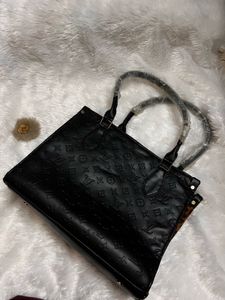 Embossed Black Handbag