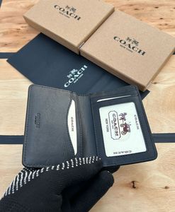Coach Signature Bifold Card holder