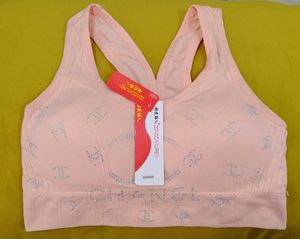 261 -- pitch Sports Bra with Rhinestone Logo