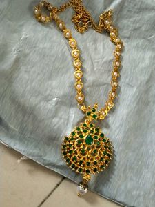 Stunning Gold Necklace with Green Stones