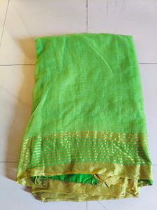 Vibrant Green Saree with Golden Border