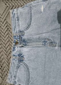 Light Wash Distressed Denim Skirt