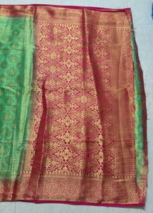 Green Silk Saree with Gold Border