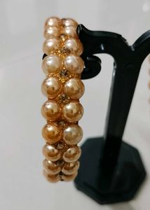 Brand new Pearl and Gold Bangles