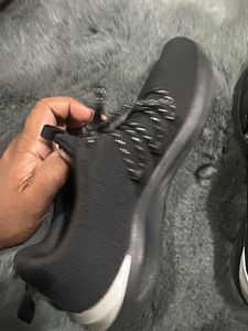 women’s Black Athletic Sneakers and lower