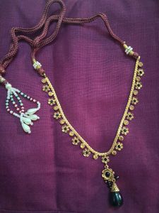 Elegant Gold Tone Necklace with Black Pendant