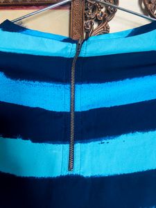 Top With Blue Colour Shades Straps Having  Chain In Back