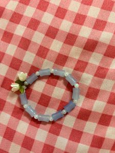 Charming Beaded Bracelet with Flower Charm