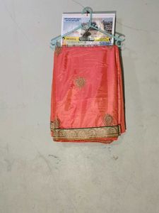 Beautiful Coral Saree with Golden Border