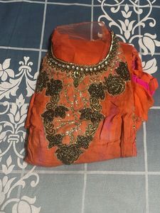Stunning Orange Embroidered Kurta Set