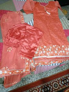 Orange Kurta Set with Intricate Detailing