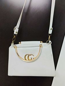 Chic White Handbag with Gold Accent