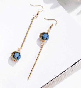 Elegant Gold Dangle Earrings with Blue Stone