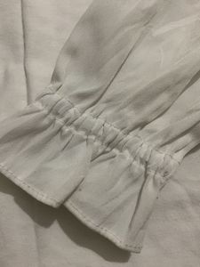 girls white ruffle top