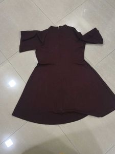 Women's Burgundy Bell Sleeve Dress with cut out.
