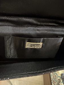 Lavie Women Foldover Clutch with Chain Strap