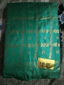 Green Silk Saree with Gold Border
